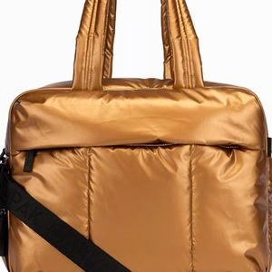 Calpak Luka duffel luggage. 12x16x7. Copper color Lightweight. 9 pocket’s